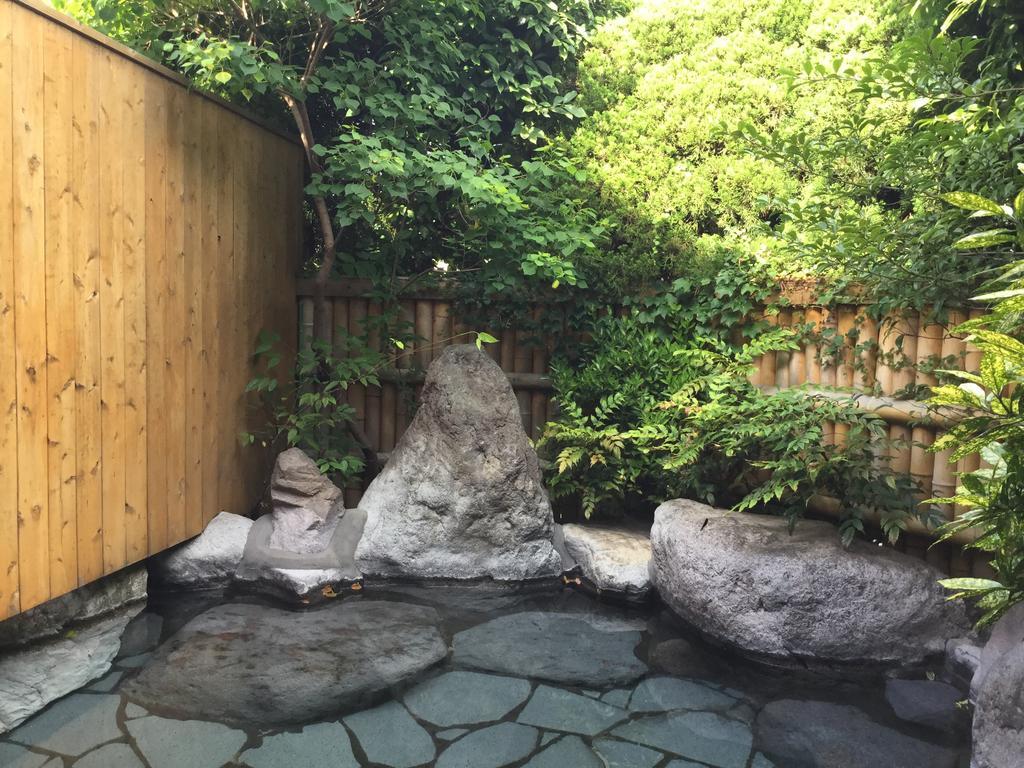 Yufuin Ryokan Tatsumi Hotell Exteriör bild